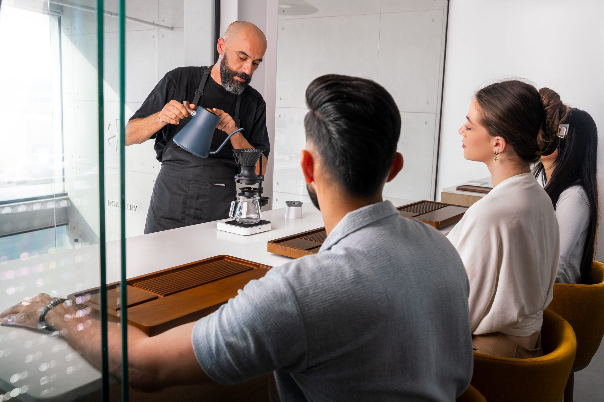Barista Serkan Sağsöz Brewing coffee at workshop