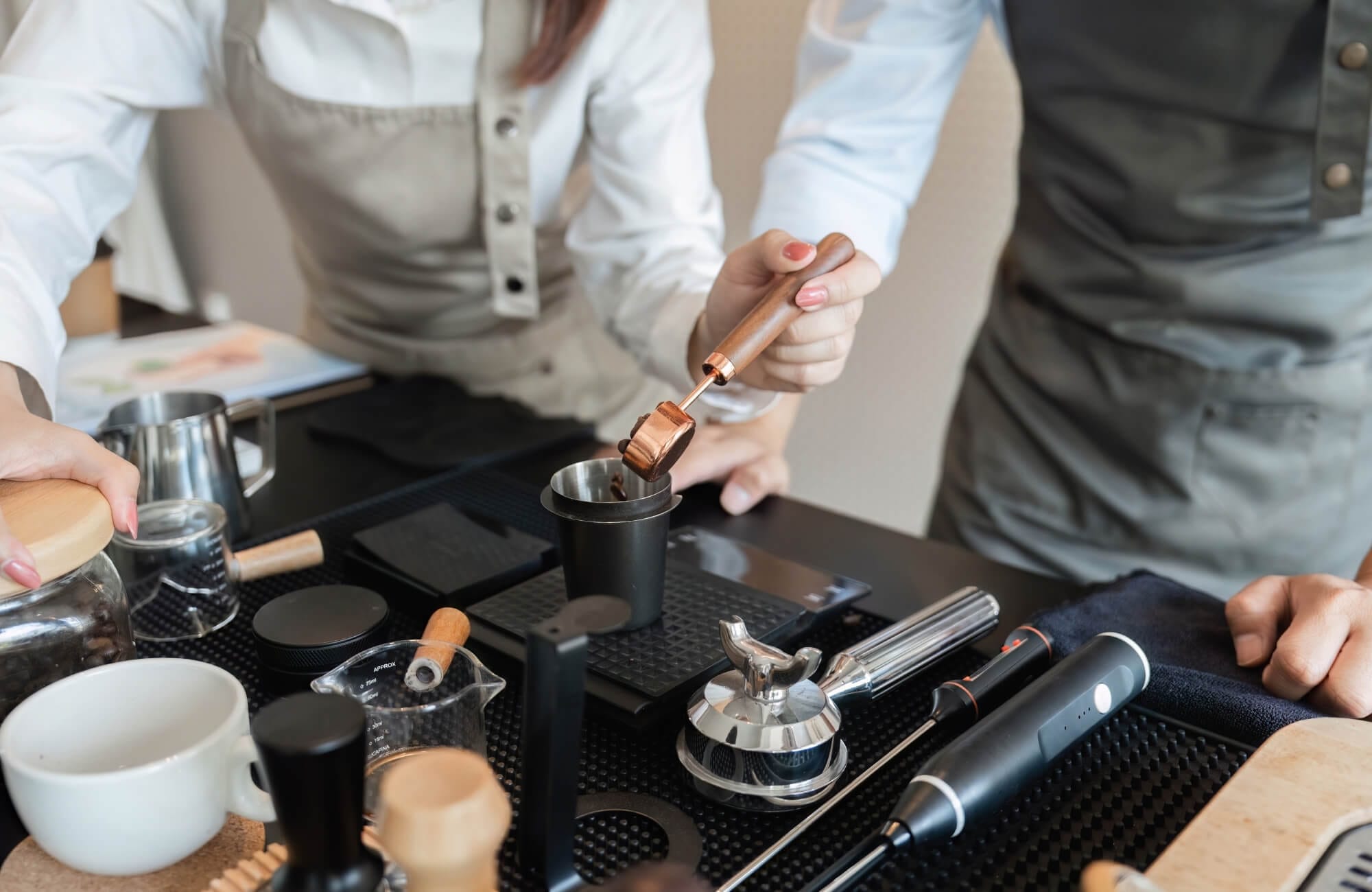 Two person using Starter Barista Kit